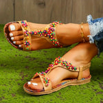 Sandalias planas con perlas de colores y tirantes en T