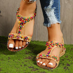 Sandalias planas con perlas de colores y tirantes en T